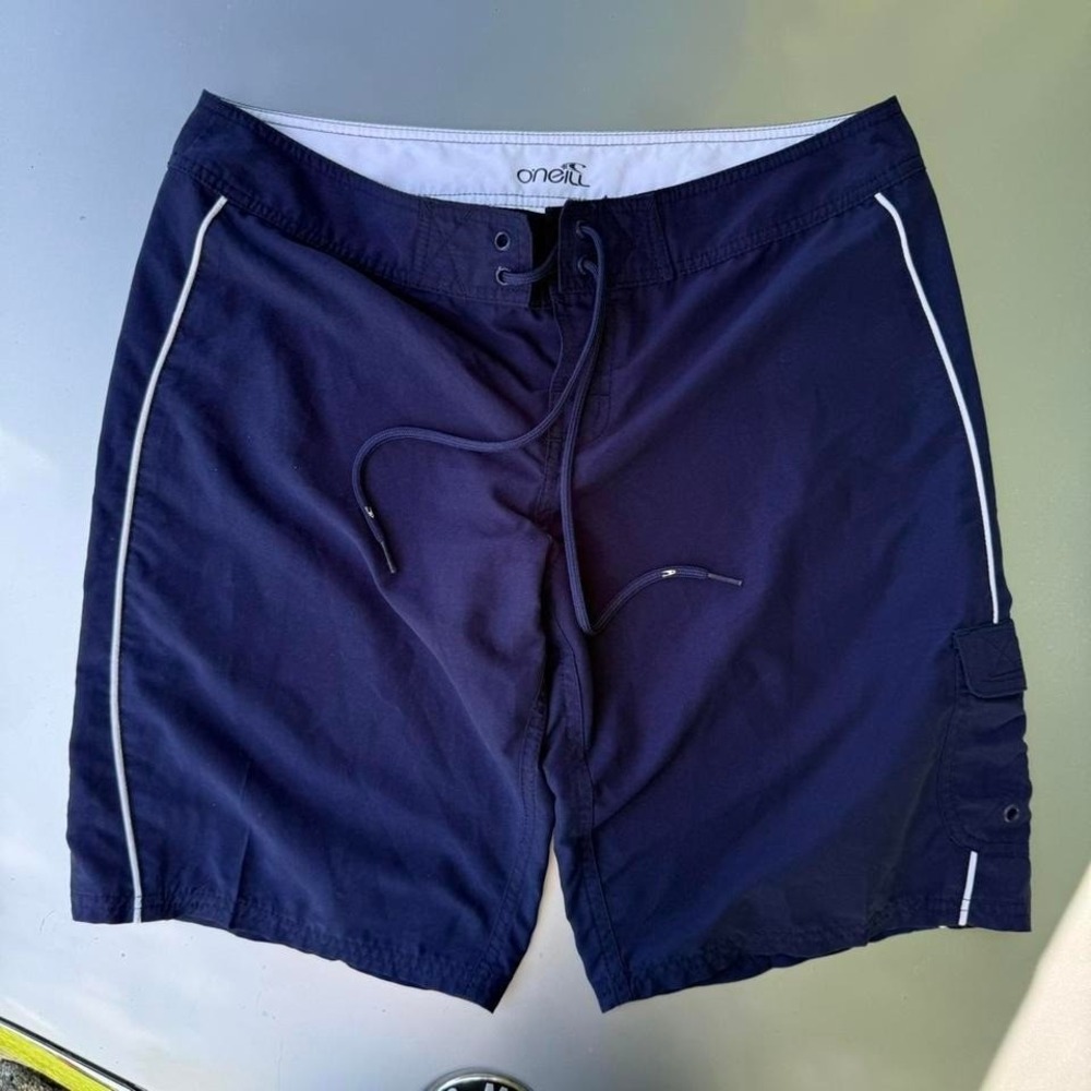 Blue Oneill swim shorts with white contrast stitching